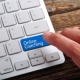 Toetsenbord met knop "Online Coaching"